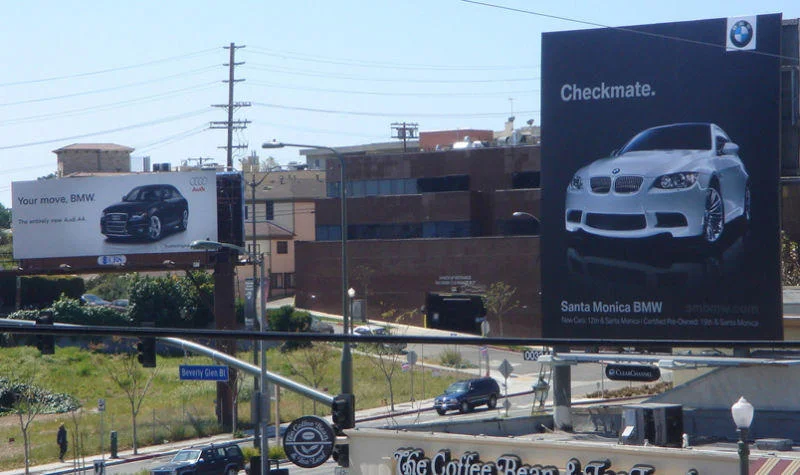 Ambush marketing Audi vs. BMW billboard war Checkmate 
