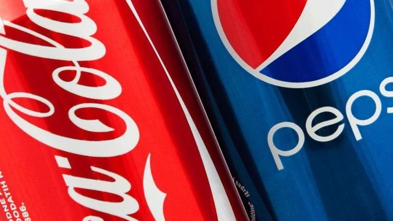 Coke and Pepsi cans image