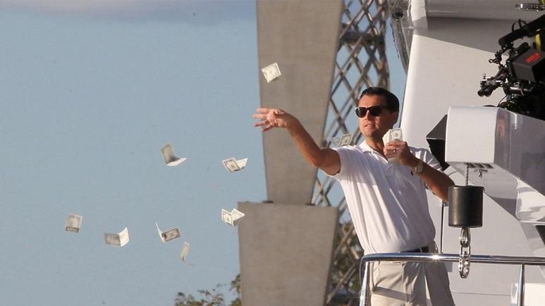 Leo throwing money in the air