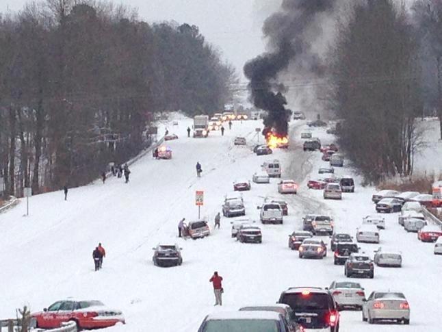 Raleigh NC snow chaos car on fire