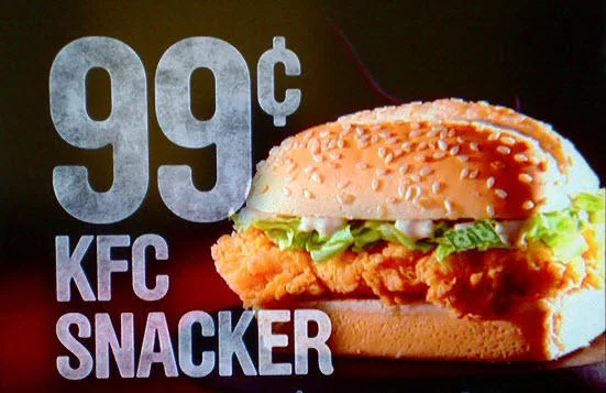 Subliminal advertising KFC Snacker sandwich dollar hidden in lettuce