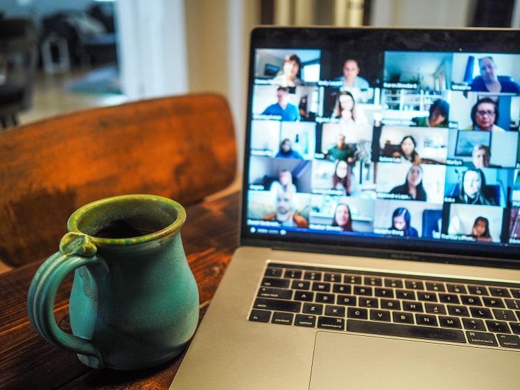 image of a video call on a laptop screen