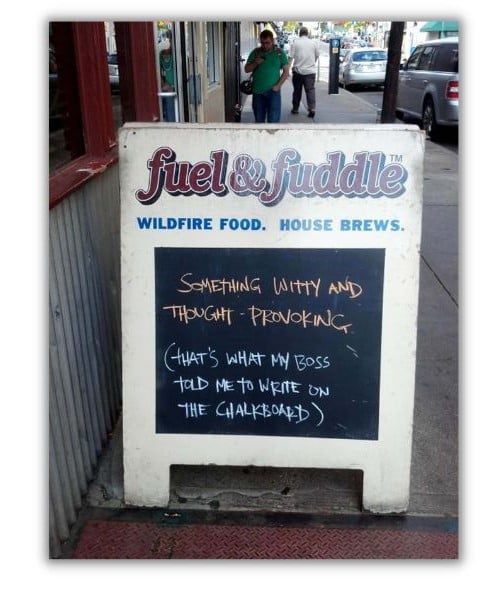 copywriting skills - sandwich board on a city sidewalk
