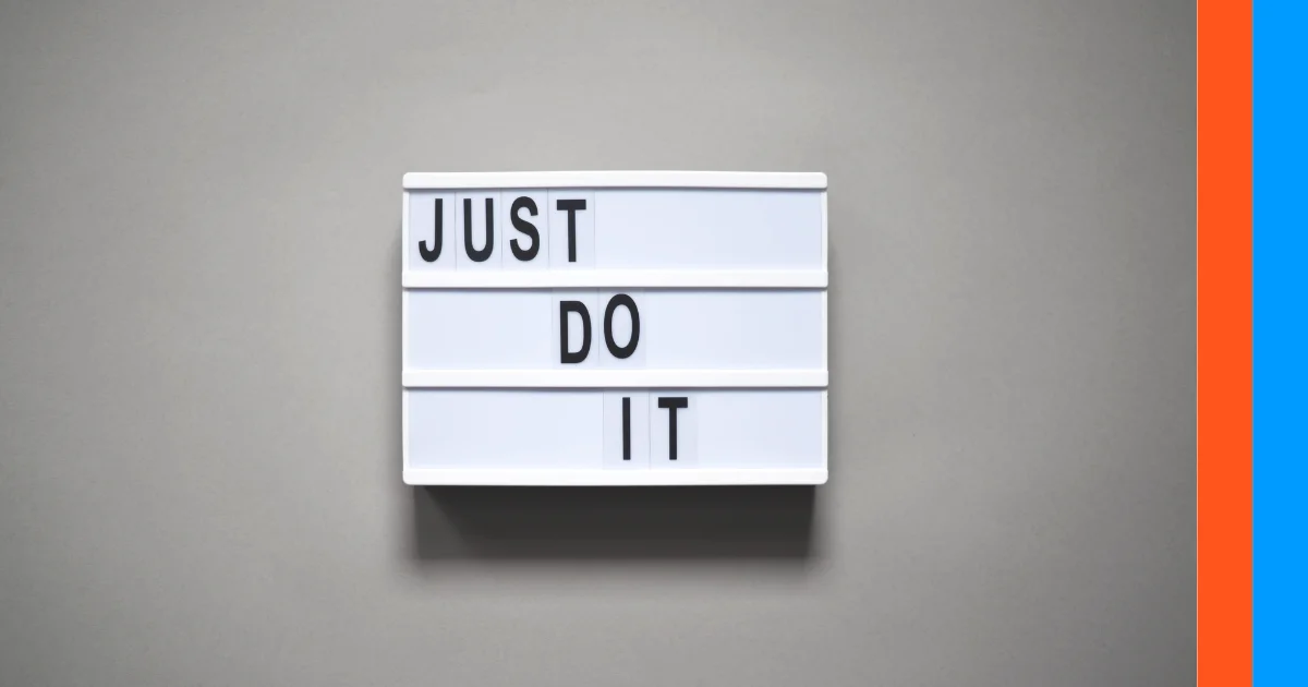 Just do it slogan on a board with a gray background.